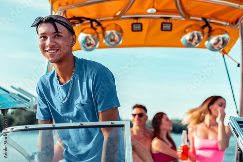 Man with a black bandanna on his head