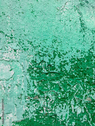 green blue turquoise concrete wall with deep relief and shadows. rough texture surface