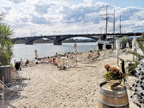 City beach (Rheinstrand) in Mainz-Kastel with theodor-heuss bridge in the background