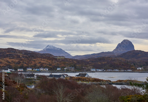 The mountain of Suilven in Assynt, taken one early morning from Lochinver Village on the West Coast of Scotland photo