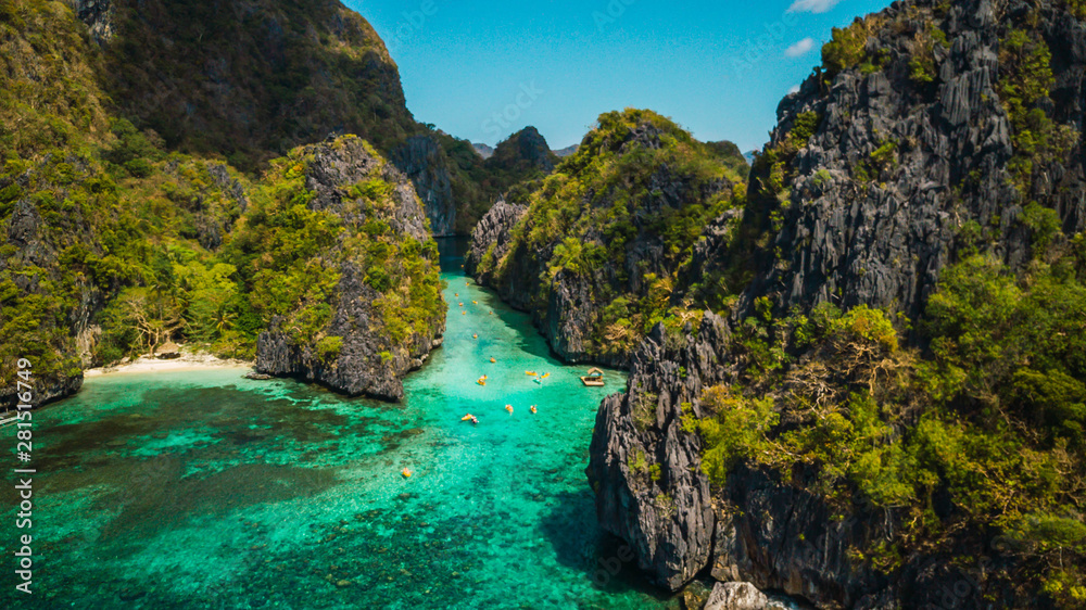 Beautiful tropical blue lagoon. Scenic landscape with sea bay and mountain islands, El Nido, Palawan, Philippines, Southeast Asia. Exotic scenery. Popular landmark, famous destination of Philippines