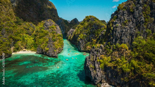 Beautiful tropical blue lagoon. Scenic landscape with sea bay and mountain islands  El Nido  Palawan  Philippines  Southeast Asia. Exotic scenery. Popular landmark  famous destination of Philippines