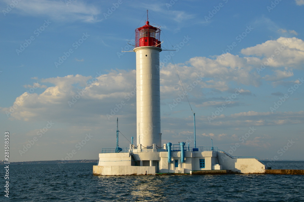 Portrait view of lighthouse at sunset