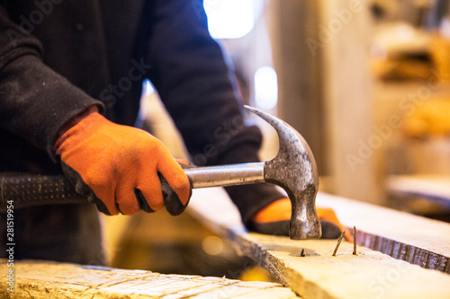 Midsection of worker working in warehouse photo