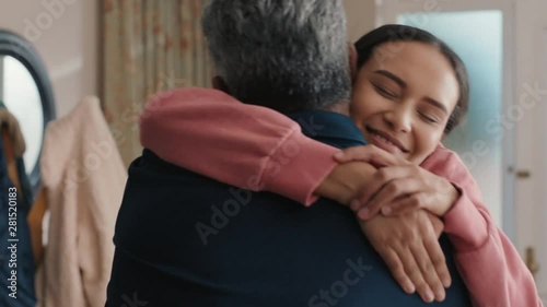 happy teenage girl hugging father congratulating daughter successful achievement excited dad feeling proud parent at home 4k