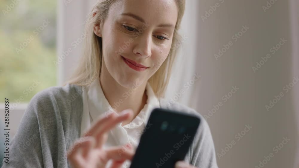 woman using smartphone texting browsing text messages enjoying digital communication shopping online on mobile phone at home 4k footage