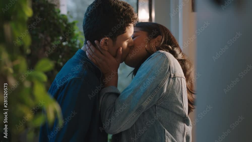 happy young couple kiss beautiful teenage girl kissing boyfriend outside home enjoying romantic evening date 4k footage happy young couple kiss beautiful teenage girl kissing boyfriend outside home enjoying romantic evening date 4k footage