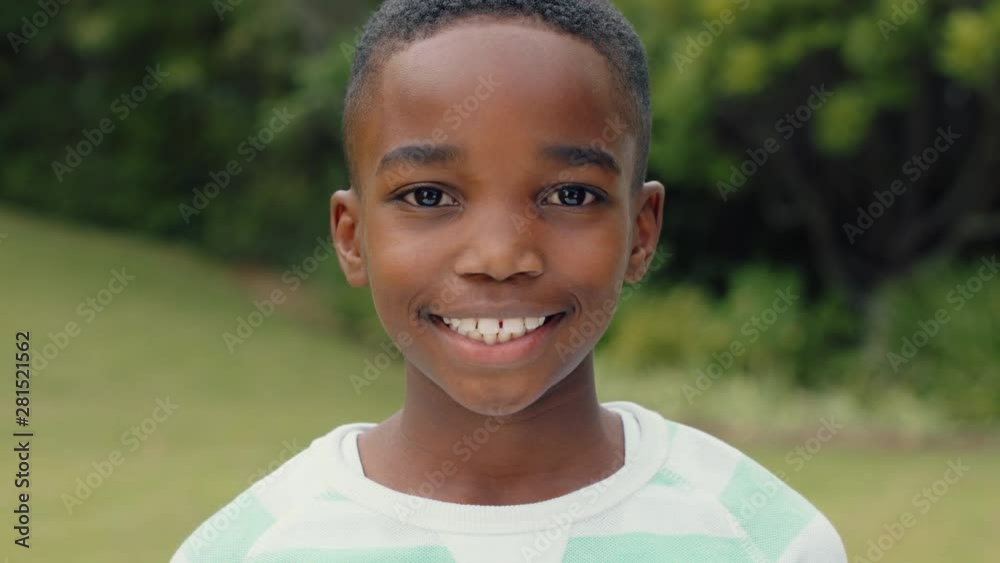 portrait cute african american boy smiling with playful excitement ...
