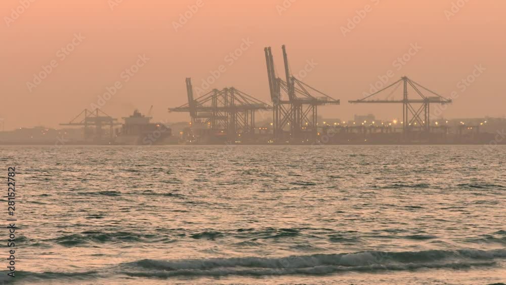 Gorgeous long shot of a shipping dock at dusk Gorgeous long shot of a shipping dock at dusk