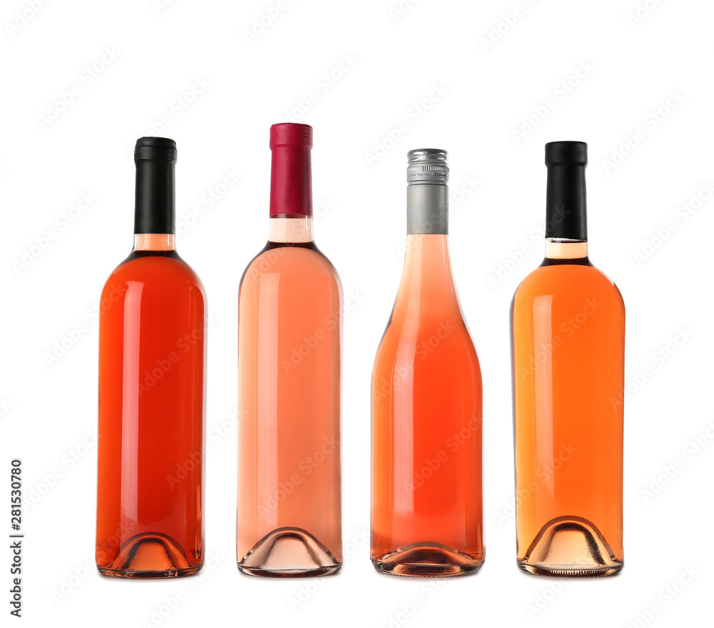 Bottles of delicious rose wine on white background. Mockup for design Bottles of delicious rose wine on white background. Mockup for design