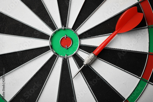 Red arrow on dart board, top view