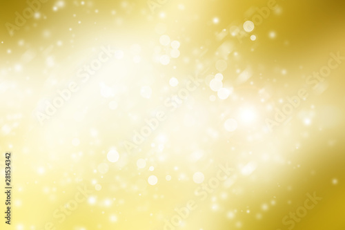 Golden sparkle blur abstract background. Bokeh Christmas blurred beautiful shiny Christmas lights