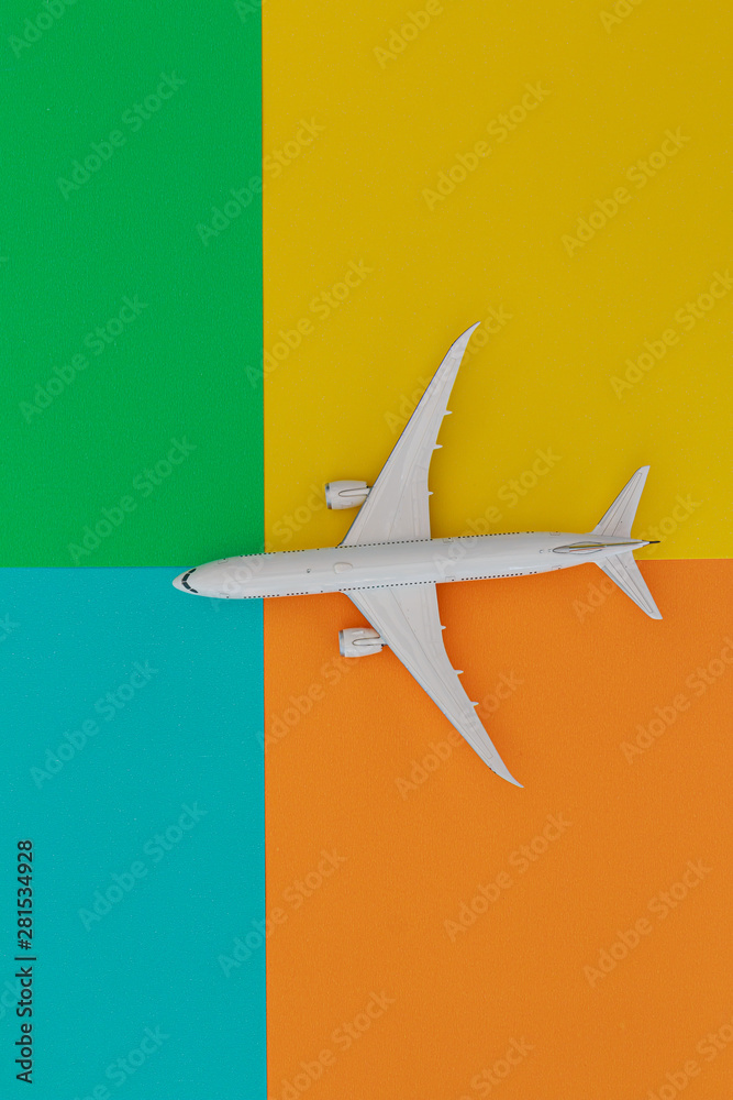 Model airplane on difference colorful bright background,Top view Model airplane on difference colorful bright background,Top view