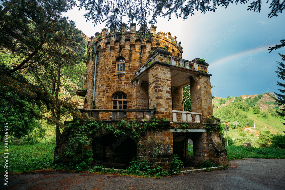 Old abandoned mansion in Gothic style in Caucasian mountains Old abandoned mansion in Gothic style in Caucasian mountains