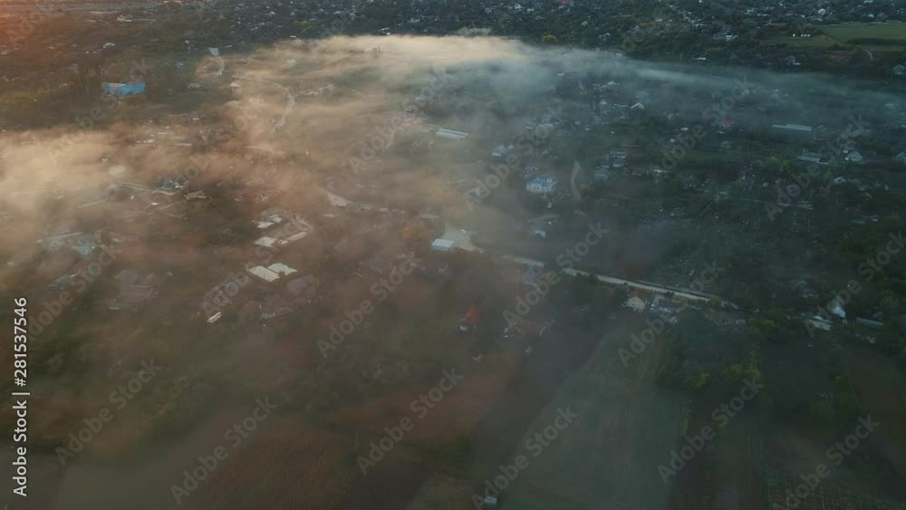 A village filmed with a drone far from above. A village filmed with a drone far from above.