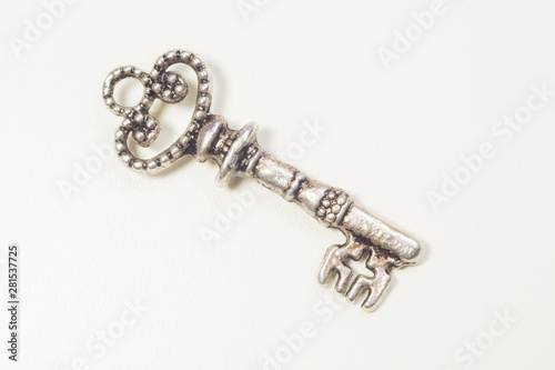 Vintage key isolated on white background. safety concept