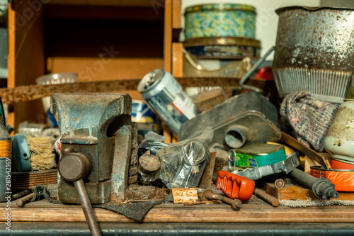 Work table of a workshop with messy tools