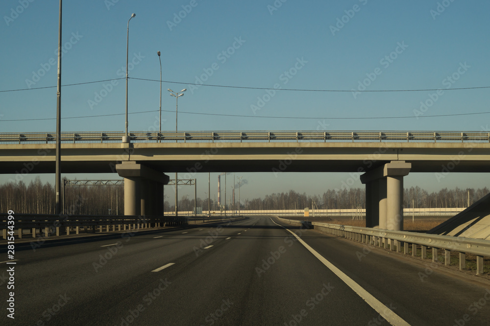 Wide highway. long roadway background. road going into the distance Wide highway. long roadway background. road going into the distance