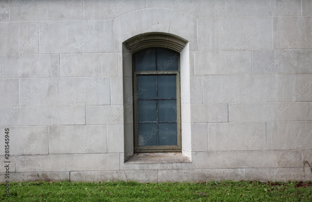 old wooden door in brick wall