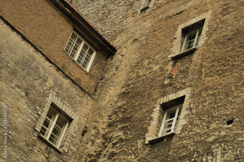 Old brick wall with windows background Old brick wall with windows background