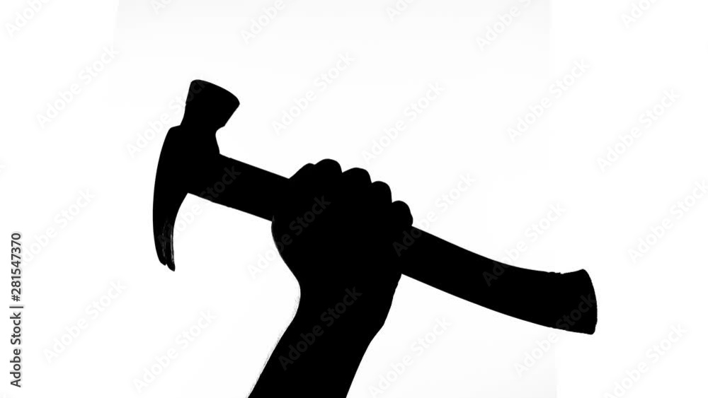 Silhouette of a hand holding a hammer Silhouette of a hand holding a hammer