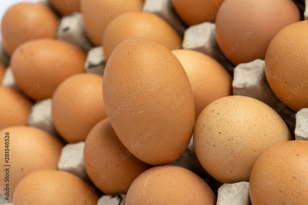 Chicken eggs are fresh in a cardboard package made of recycled waste paper. Chicken eggs are fresh in a cardboard package made of recycled waste paper.