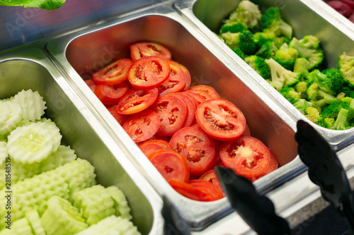Salad bar include organic vegetables and tomatoes, healthy concept.
