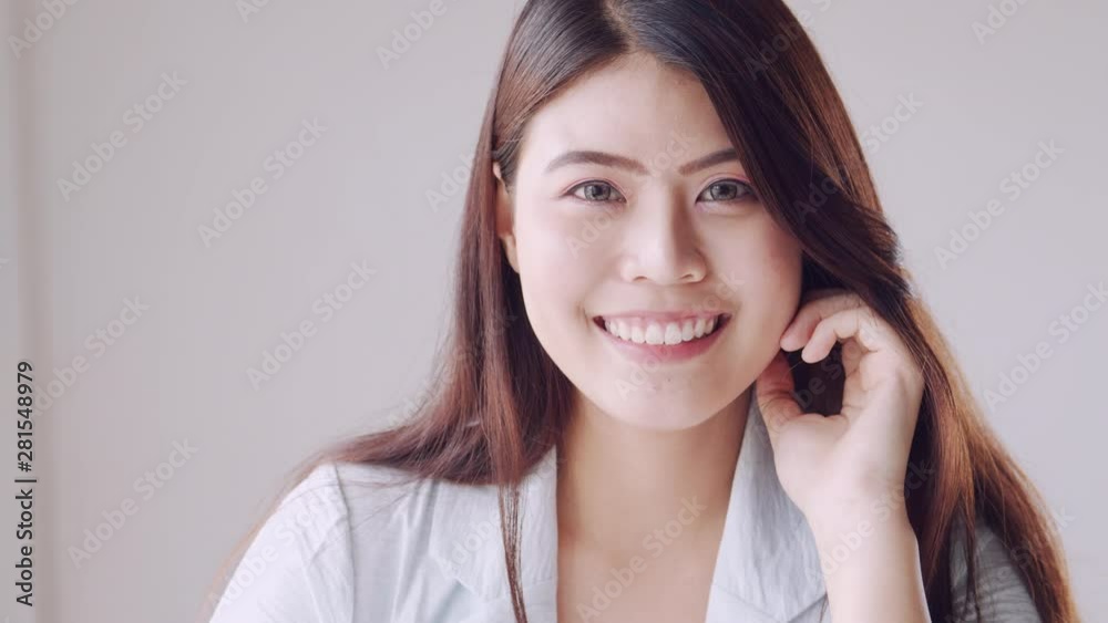 Close shot beautiful of Asian business women sitting smiling and happiness Close shot beautiful of Asian business women sitting smiling and happiness