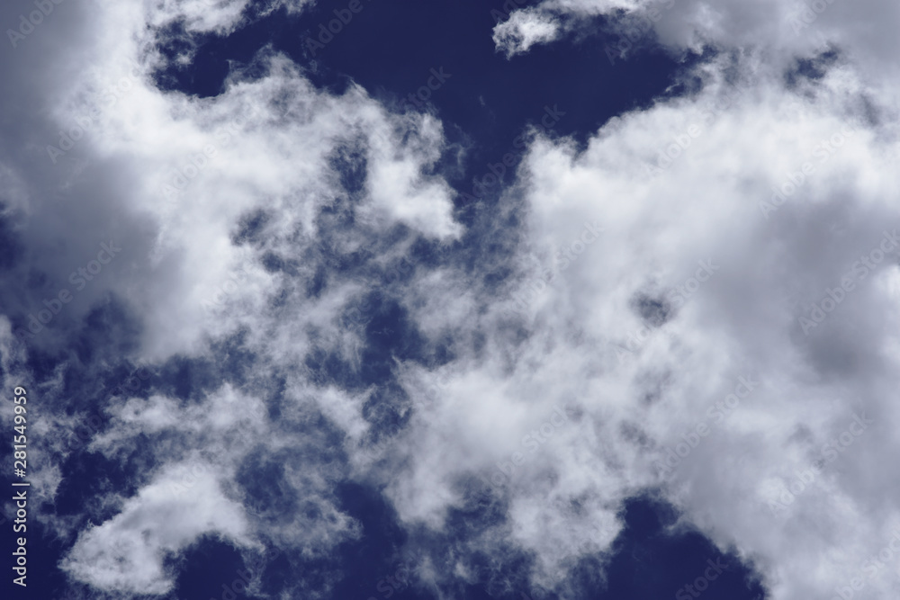 movement of white cloud over sky.