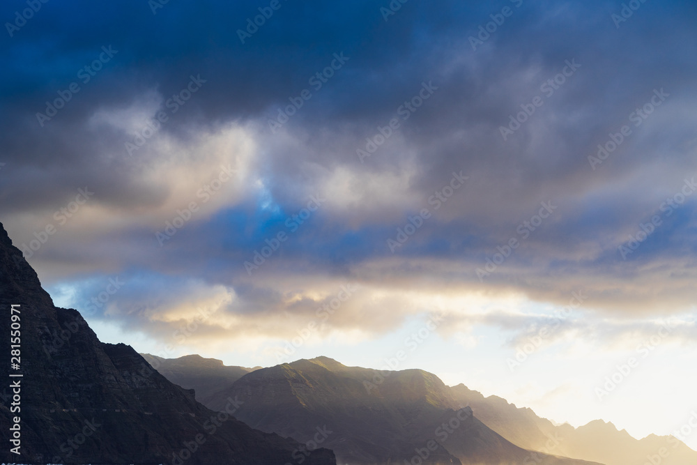 Blue mountain during sunset with awesome clouds Blue mountain during sunset with awesome clouds