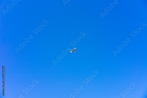 Airplane flying in the sky with no clouds