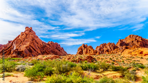 Red Aztec Sandstone Mountains under Blue Sky at the Mouse's Tank Trail in the Valley of Fire State Park in Nevada, USA