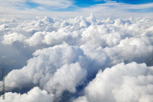 Obraz na płótnie Take aerial photos of the sea of clouds on the plane.