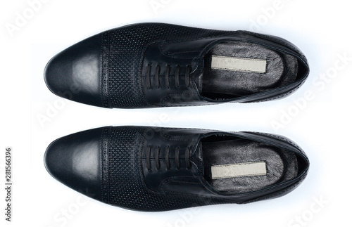 Classic male leather shoes isolated on a white, top view.