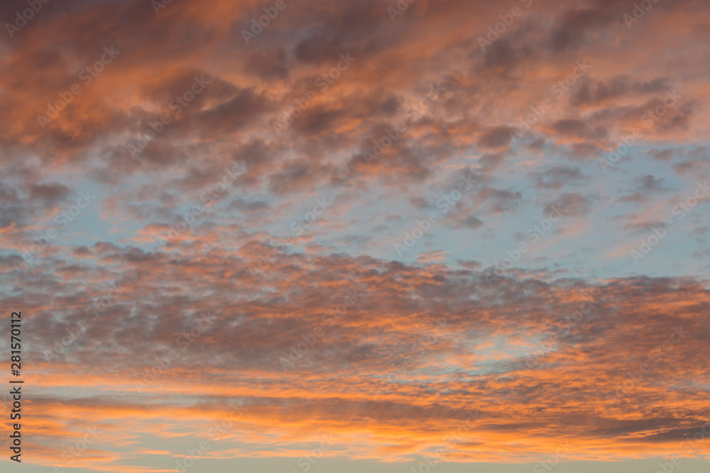 red sunset clouds in the blue sky red sunset clouds in the blue sky
