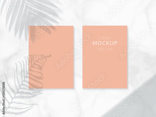Cards mockups with shadow overlays from leaf and palm branches on white marble background texture