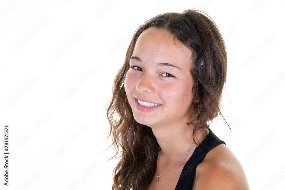 Portrait of young happy teenage girl smiling in white copy space background Portrait of young happy teenage girl smiling in white copy space background