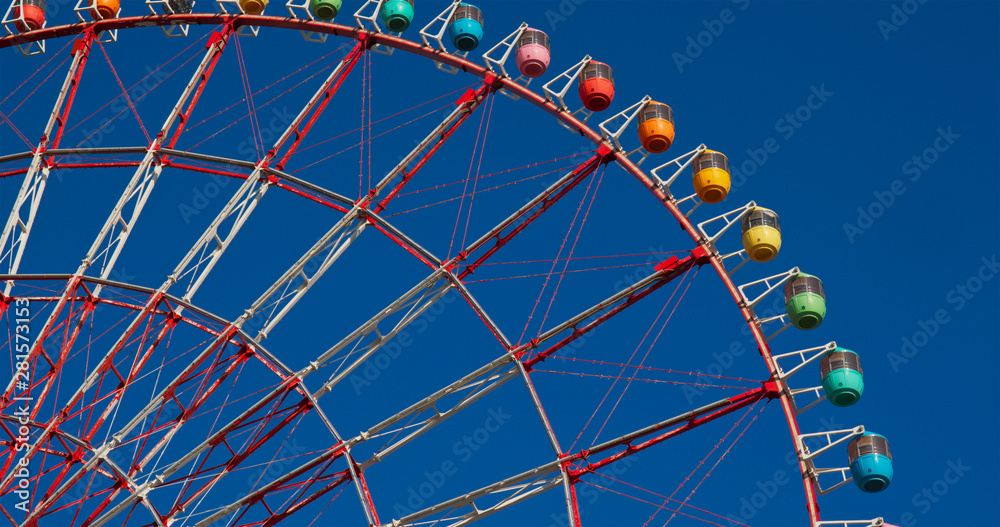 Ferris Wheel with clear blue sunny sky