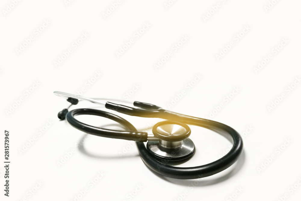 Fototapeta premium Black stethoscope on white background.