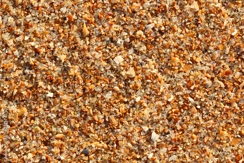 Background from sand texture yellow on the sea beach close-up macro.