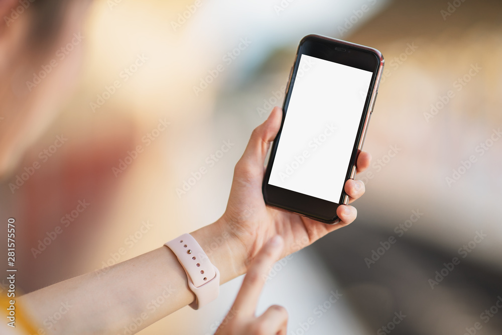 Female hand and blank screen mobile smart phone	