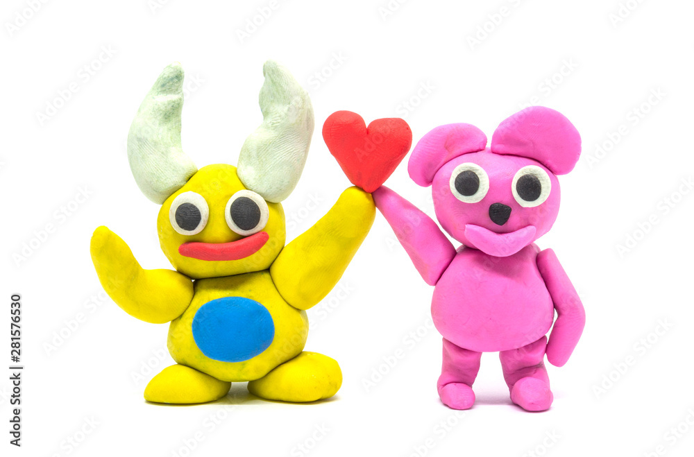 Play dough Beetle and Bear on white background. Handmade clay plasticine