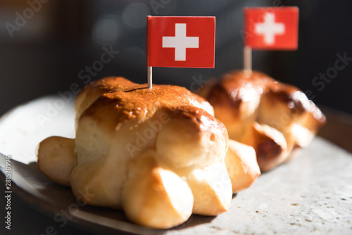 Swiss National Day, August 1st, special bread rolls with a small Swiss flag on top