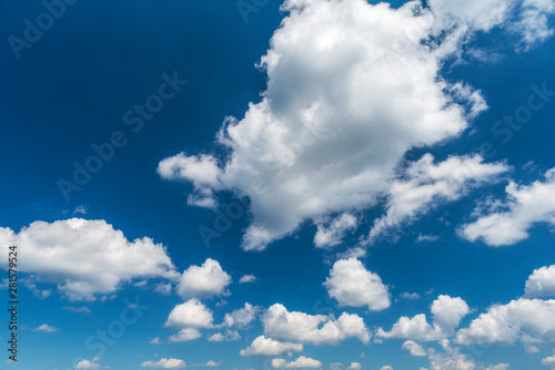 Fototapeta Naklejka Na Ścianę i Meble -  Blue sky background with tiny white clouds.