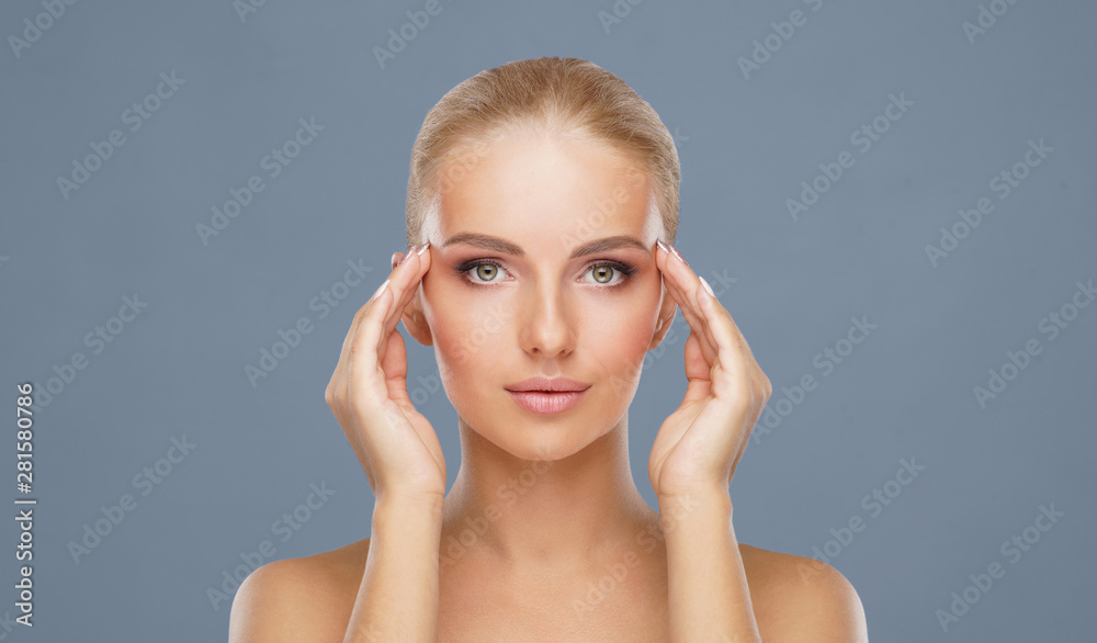 Attractive face of beautiful girl. Close-up portrait of healthy woman. Skin care, cosmetics, makeup, complexion and face lifting. Attractive face of beautiful girl. Close-up portrait of healthy woman. Skin care, cosmetics, makeup, complexion and face lifting.