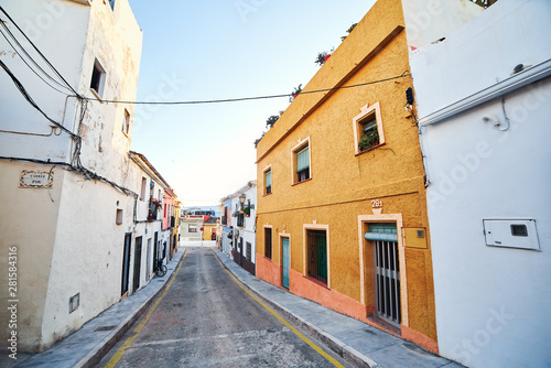DENIA  SPAIN - JUNE 19  2019  Old town of Denia with narrow streets and coloured houses.