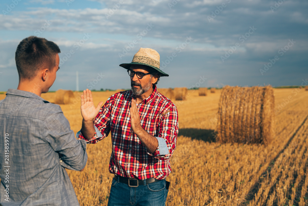farmers on cultivated wheat filed talking farmers on cultivated wheat filed talking