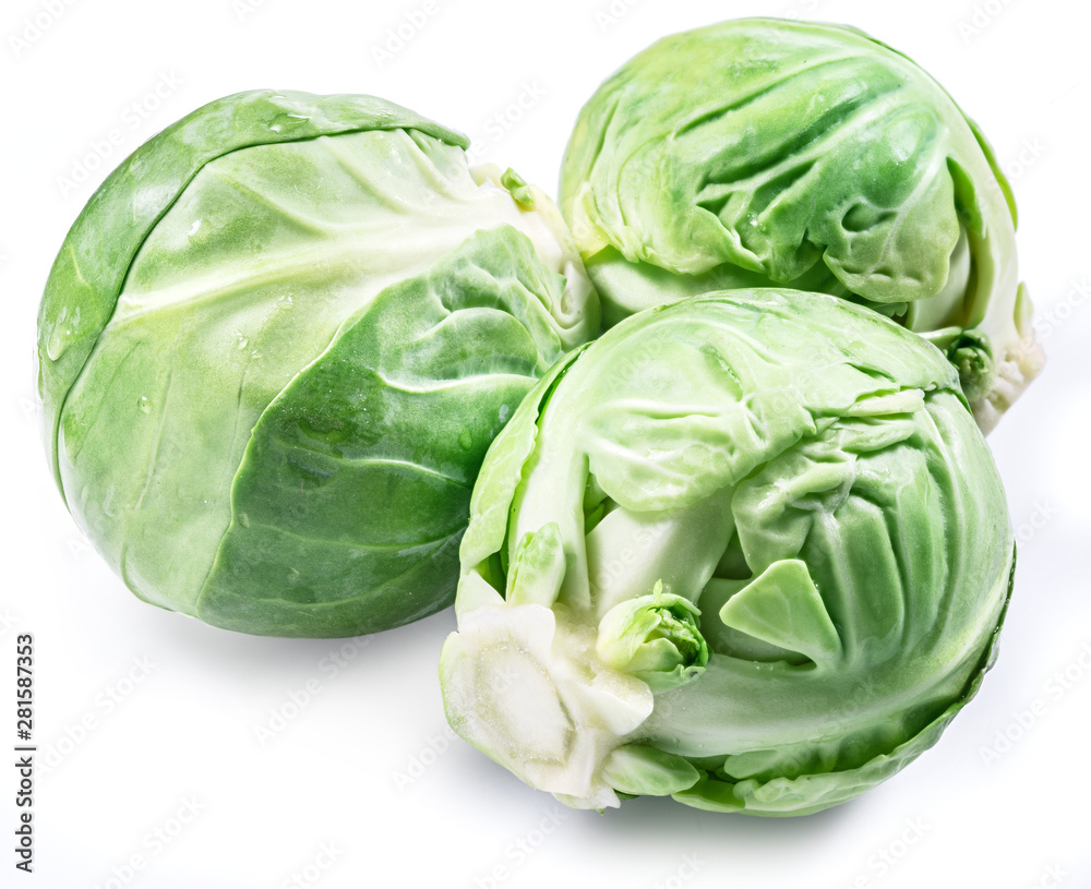 Fototapeta premium Green brussel sprouts on white background.