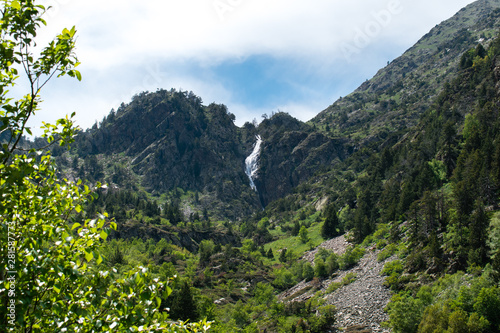 Landscape with waterfall in the mountains in summer at Parc Natural del Comapedrosa, Arinsal, Andorra photo