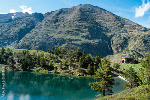 Mountain lake Estany de les Truites in Andorra Pyrenees, La Massana, refugi de coma pedrosa photo